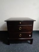 A Stag Minstrel two drawer bedside chest with slide