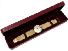 A gent's 9ct gold Omega Geneva calendar centre seconds wristwatch, circa 1970,