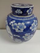 A Chinese blue and white lidded temple jar, height 21.
