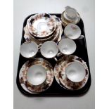 A tray containing a 21 piece English bone china tea service