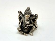 A large silver ring depicting Ganesha, size T.