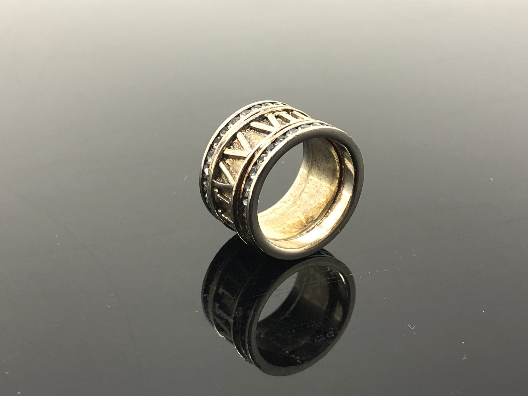 A Greek style band ring