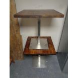 A pair of pine topped metal based cafe tables