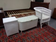 A painted wicker armchair together with a painted loom blanket box and linen box