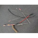 Two archery bows with arrows