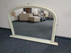 A contemporary over mantel mirror