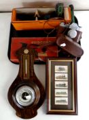 A tray containing miscellaneous to include Zenit camera in case, barometer mounted on a board,