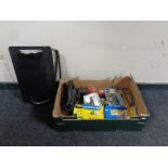 A box containing power tools to include a Hilti 110V drill, hand held saw,