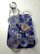 A tray containing a quantity of glassware to include cut glass decanter with stopper, candlesticks,