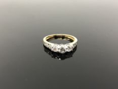 An 18ct gold diamond ring,