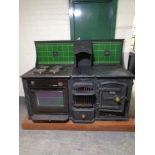 An Arrowsmith & Havis Victorian style tiled back range cooker fitted with a Hygena oven and hob,