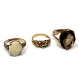 Three 9ct gold rings. CONDITION REPORT: 7.2g gross.