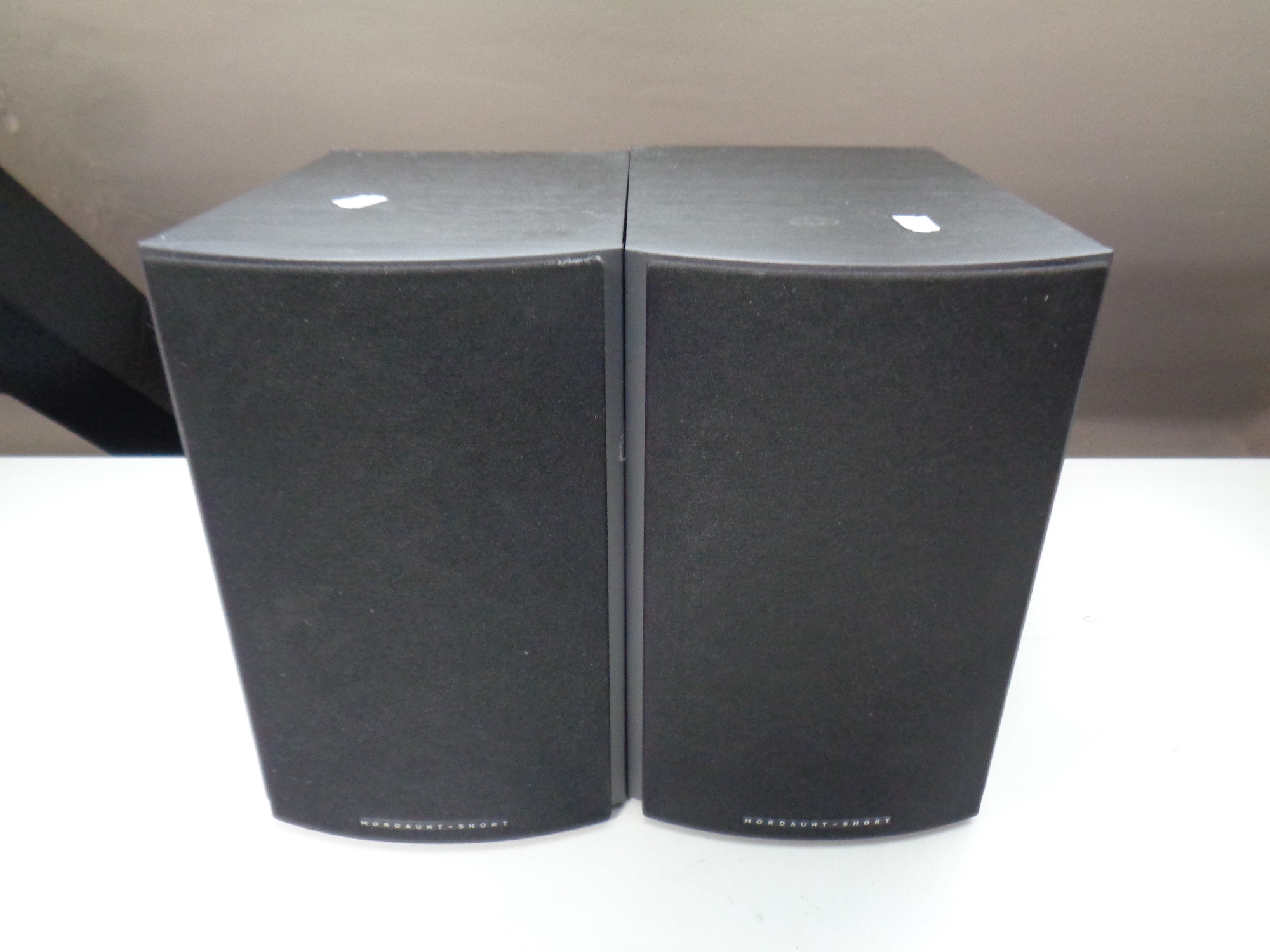 A pair of Mordaunt Short speakers on speaker stands