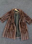 A mink three quarter length fur coat