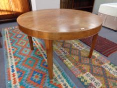 A 20th century Danish circular teak dining table