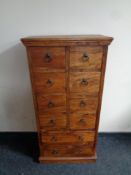A sheesham wood ten drawer chest
