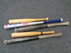 Five assorted rounders and base ball bats