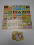 A bundle of 43 Pokemon cards to include Trainer and Energy cards