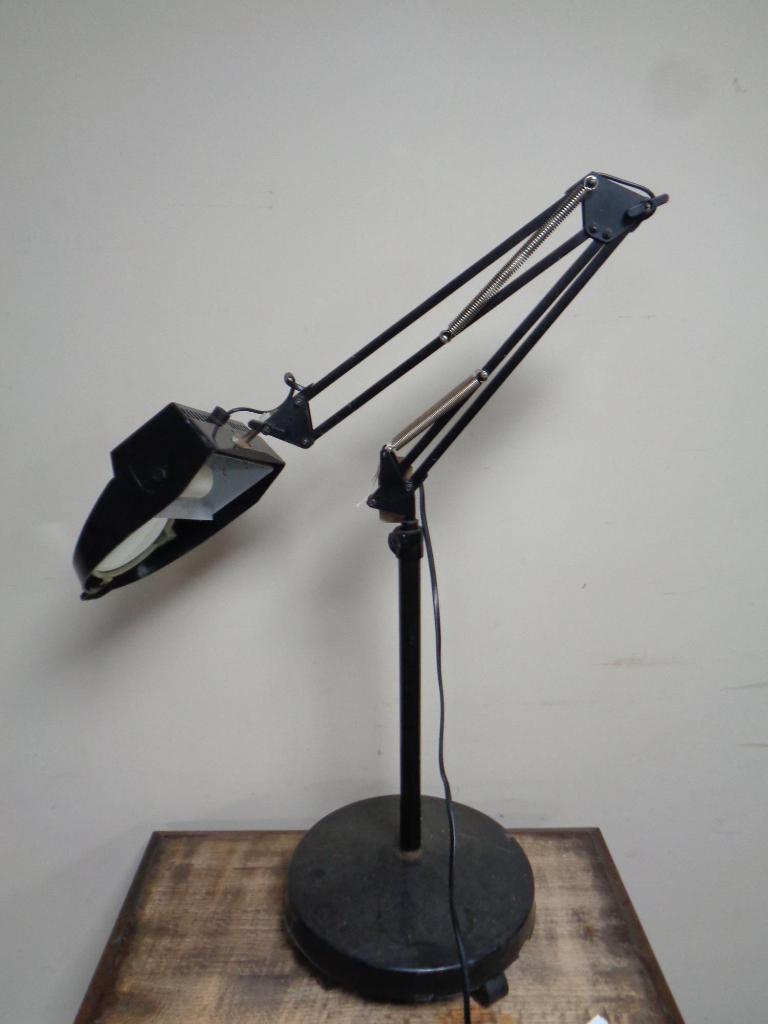 A 20th century floor standing angle poise magnifying lamp