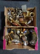 Two boxes of antique and later metal ware : candlesticks, hand bell, tankards,