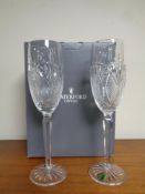 A pair of Waterford Crystal champagne flutes (boxed)