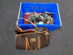 A crate containing a copy Louis Vuitton holdall containing approximately 12 kilograms of assorted