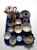 A tray containing a quantity of antique oriental wares to include teapot, tea bowls,