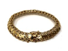 An eastern yellow gold bracelet, indistinctly stamped. CONDITION REPORT: 17.2g.