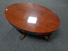 A contemporary Country Corner rosewood effect Art Deco coffee table (as found)