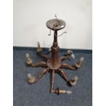 An antique beech wood eight branch chandelier (as found)