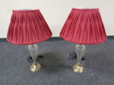 A pair of cut glass twist stem table lamps with shades