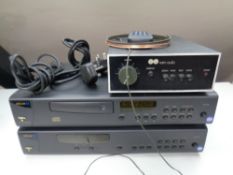 An Arcam Alpha 8 CD player together with Alpha 7 AM-FM tuner and a Naim audio amp