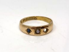 An antique 15ct gold sapphire and pearl ring, (one stone missing),