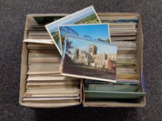 Two boxes containing a quantity of early 20th century and later postcards to include birthday