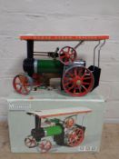 A Mamod steam tractor,