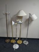 Five assorted continental floor and angle poised lamps