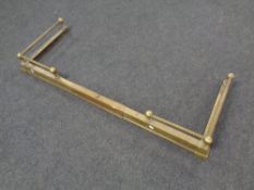 A 19th century brass telescopic fire curb 132.5 cm x 50 cm.