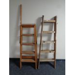 Two pairs of folding wooden steps