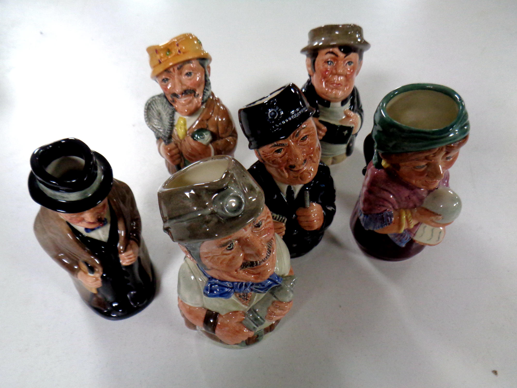 Five Royal Doulton 'The Doultonville Collection' character jugs to include the Fisherman,
