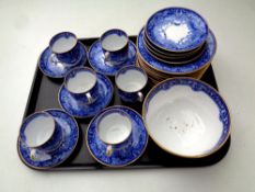 A tray containing 28 pieces of 19th century Copeland gilt rimmed blue and white tea china