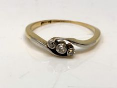 An antique 18ct gold three stone diamond ring, size N. CONDITION REPORT: 2.