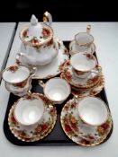 A tray containing a 22 piece Royal Albert Old Country Roses bone china tea service