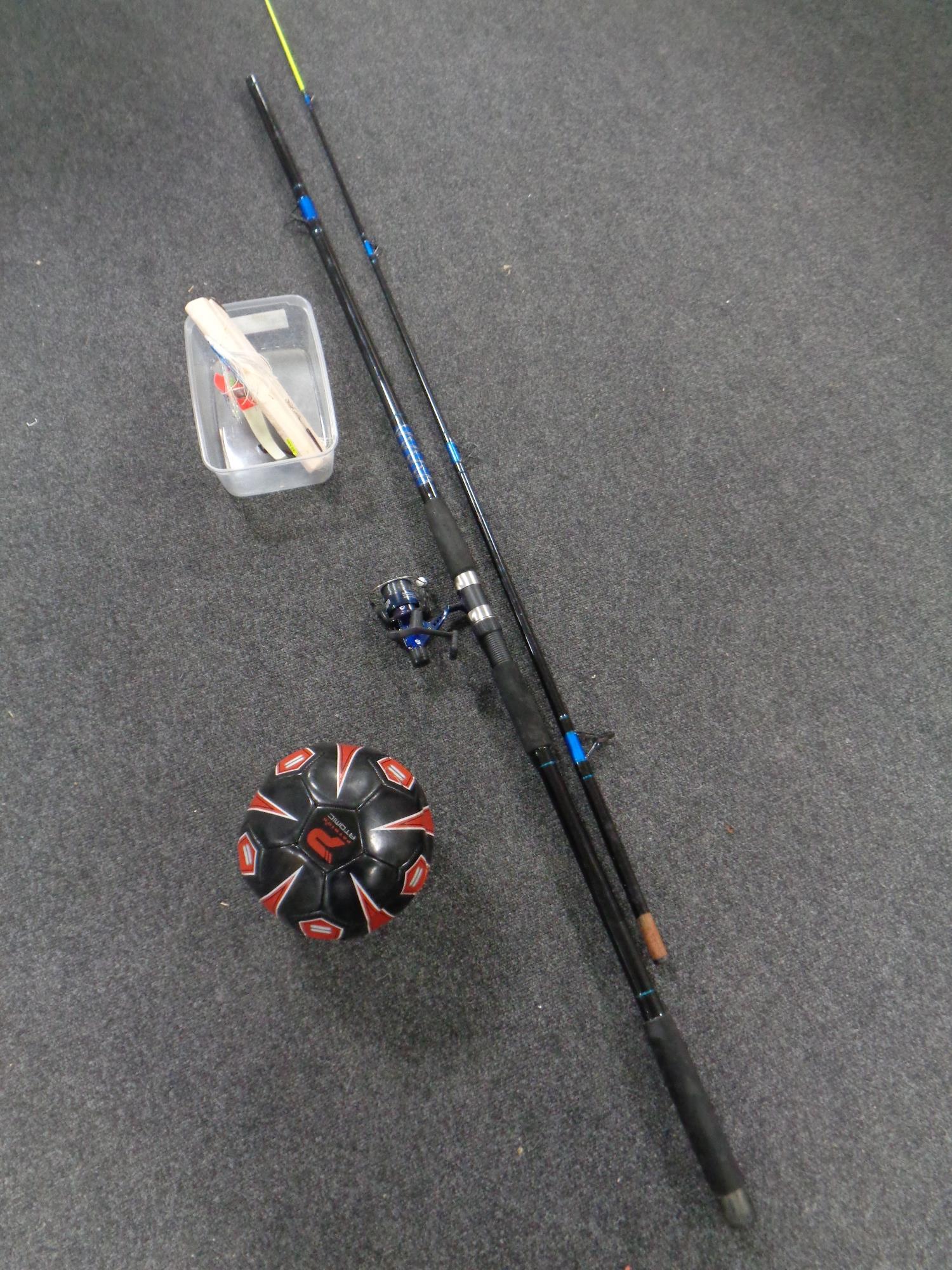 A two piece Power stick beach caster with reel and a football