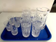 A tray containing a good quality lead crystal water jug with five matching high ball glasses and