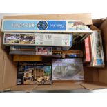 A box containing eight boxed plastic modelling kits to include Airfix and Italeri to include