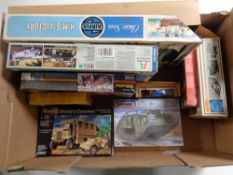 A box containing eight boxed plastic modelling kits to include Airfix and Italeri to include