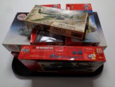 A tray containing six boxed Airfix plastic modelling kits to include military aircraft and vehicles