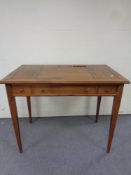 A Gola Furniture pine writing desk