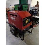 A Mosa GE 6000 SX-GS super silenced portable site generator with key