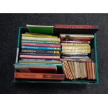 A crate of assorted books : Haynes car manuals, travel guides,